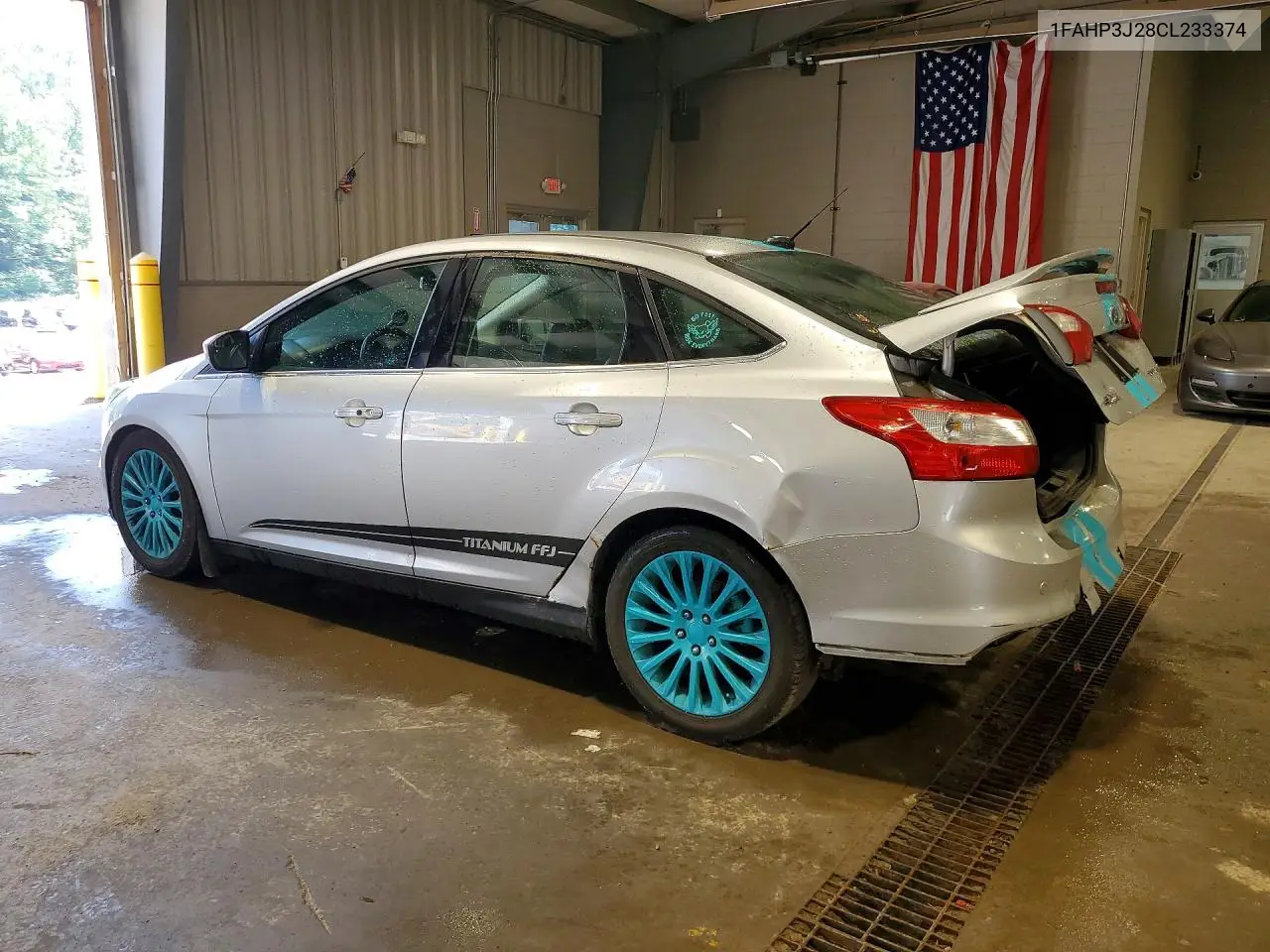 2012 Ford Focus VIN: 1FAHP3J28CL233374 Lot: 59864666