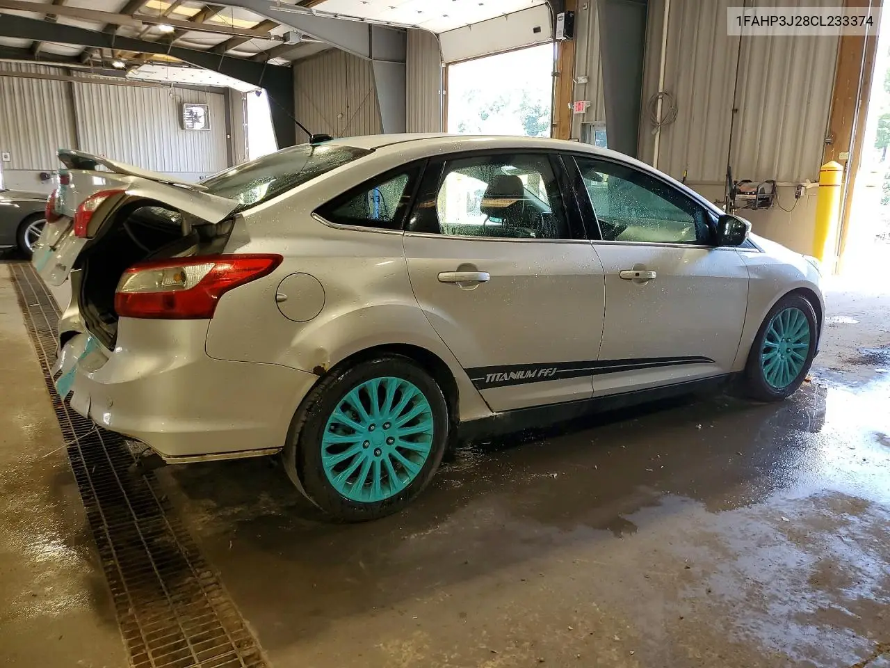 2012 Ford Focus VIN: 1FAHP3J28CL233374 Lot: 59864666