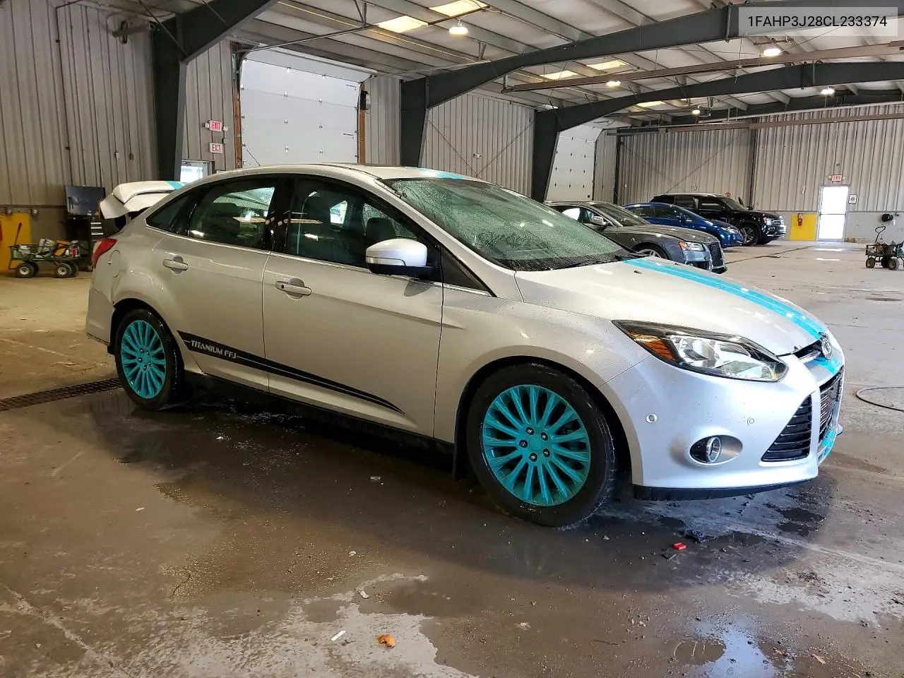 2012 Ford Focus VIN: 1FAHP3J28CL233374 Lot: 59864666