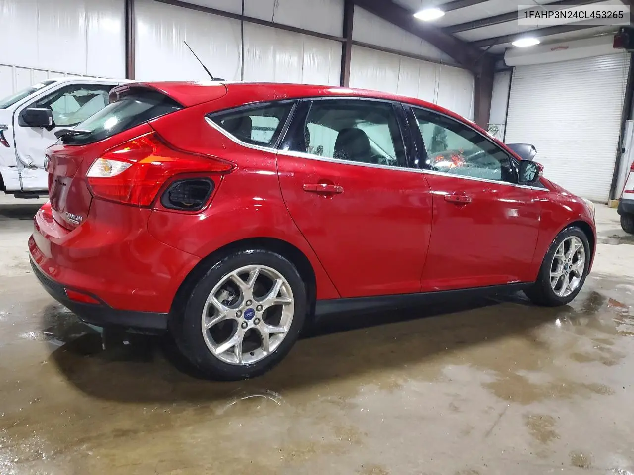 2012 Ford Focus Titanium VIN: 1FAHP3N24CL453265 Lot: 61298396