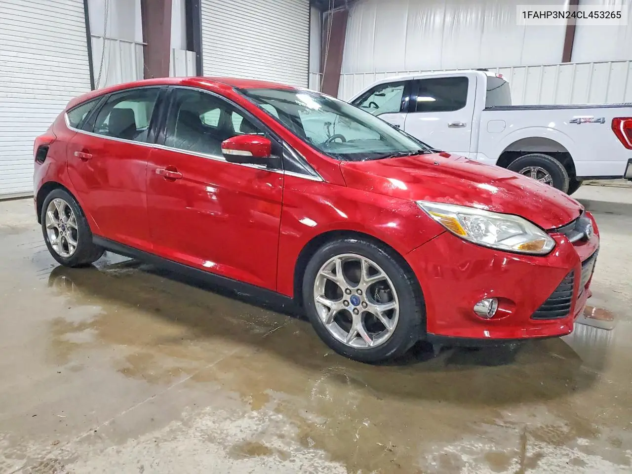2012 Ford Focus Titanium VIN: 1FAHP3N24CL453265 Lot: 61298396