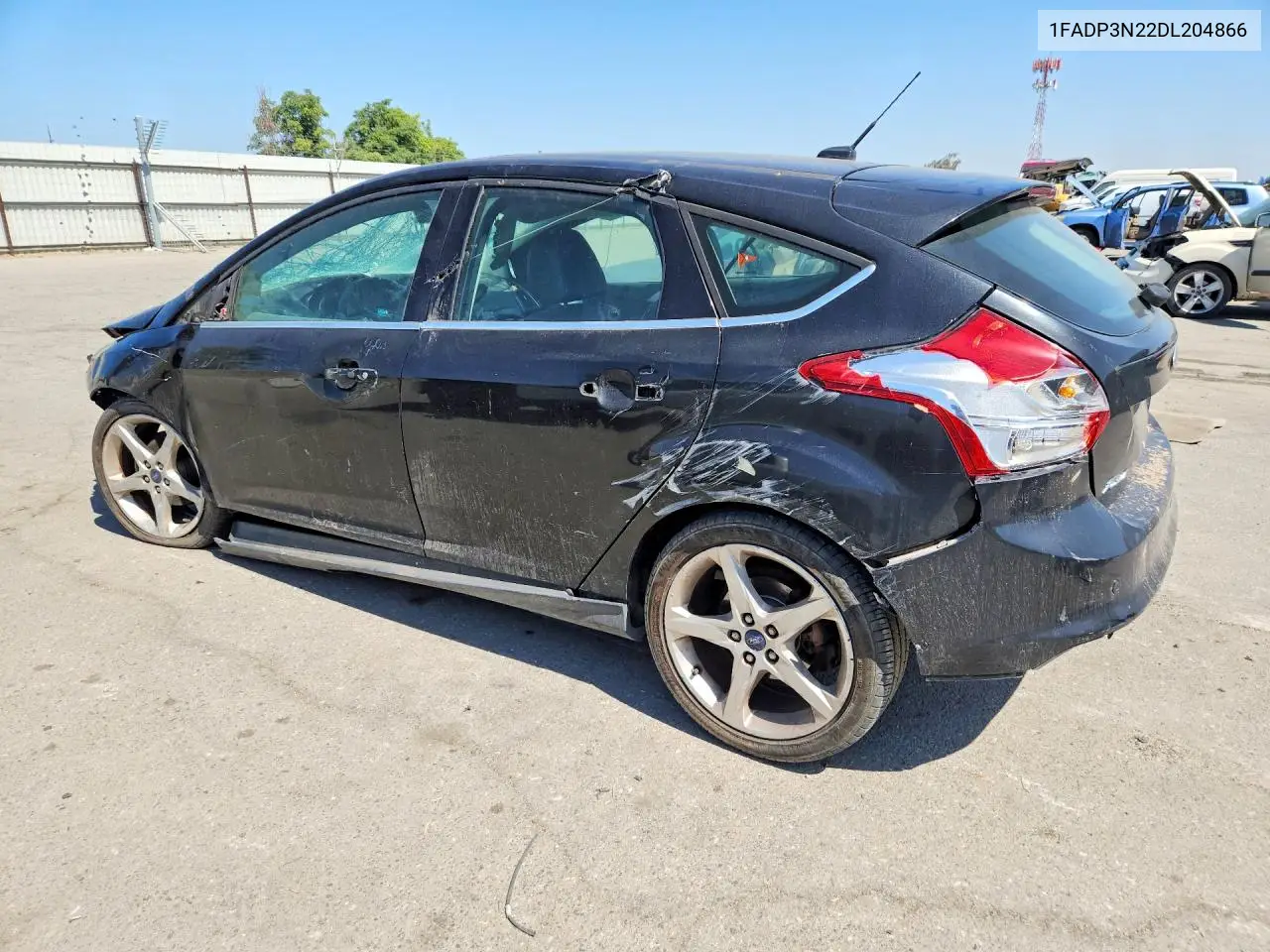 2013 Ford Focus Titanium VIN: 1FADP3N22DL204866 Lot: 56130786
