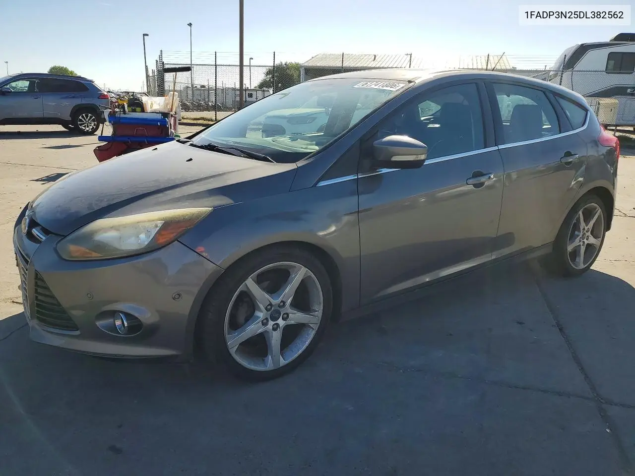 2013 Ford Focus Titanium VIN: 1FADP3N25DL382562 Lot: 61741806