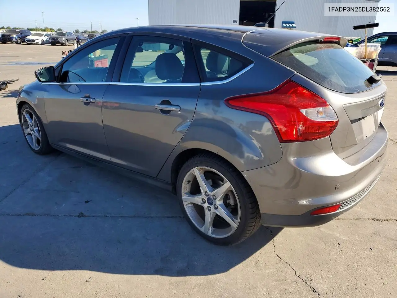 2013 Ford Focus Titanium VIN: 1FADP3N25DL382562 Lot: 61741806