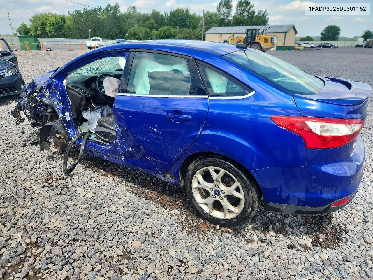 2013 Ford Focus Titanium VIN: 1FADP3J25DL301162 Lot: 61966616