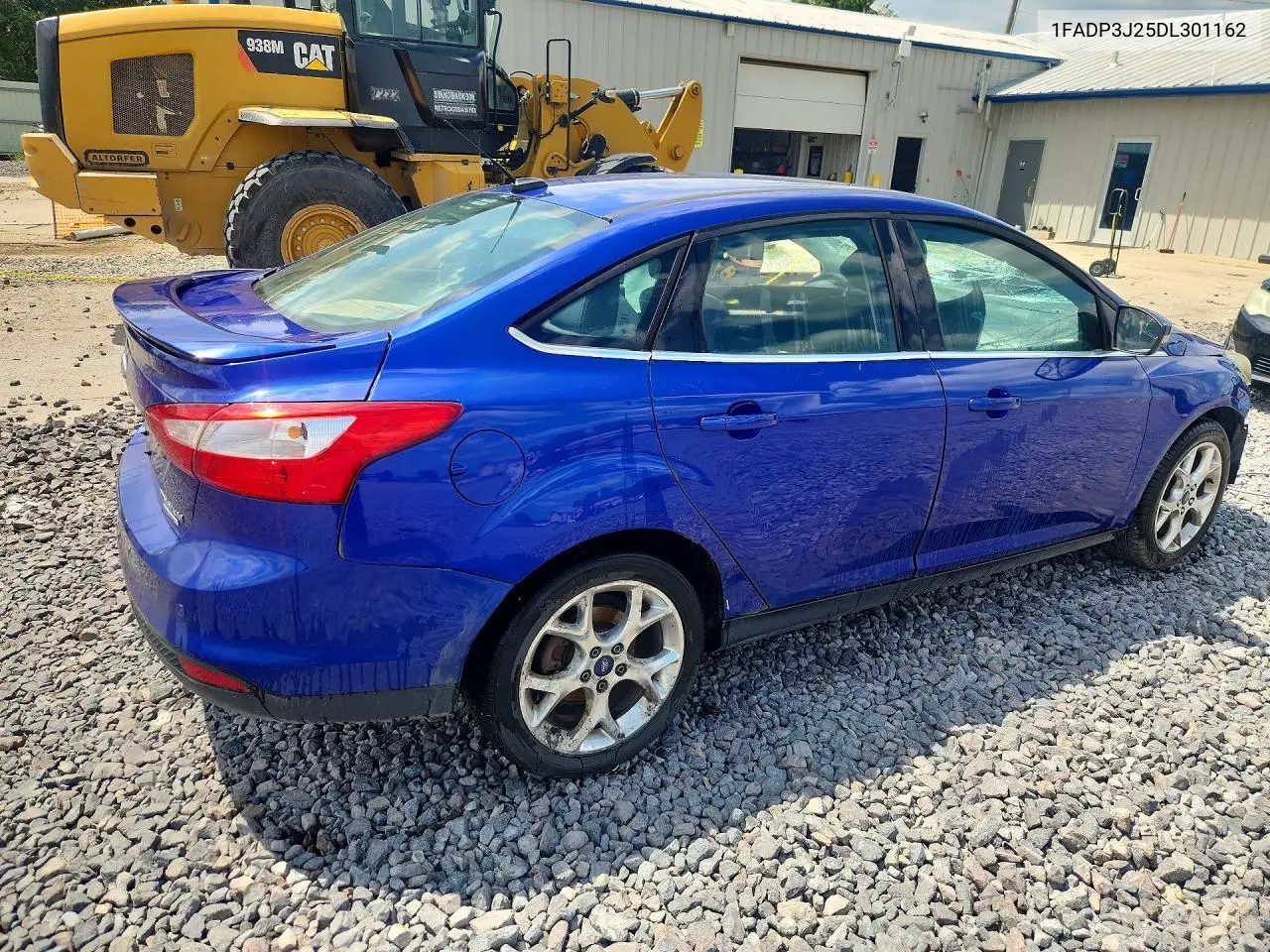 2013 Ford Focus Titanium VIN: 1FADP3J25DL301162 Lot: 61966616