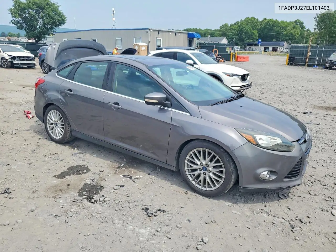 2014 Ford Focus Titanium VIN: 1FADP3J27EL101403 Lot: 61189796