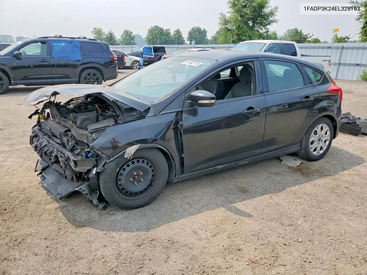 2014 Ford Focus Se VIN: 1FADP3K24EL329163 Lot: 61302776