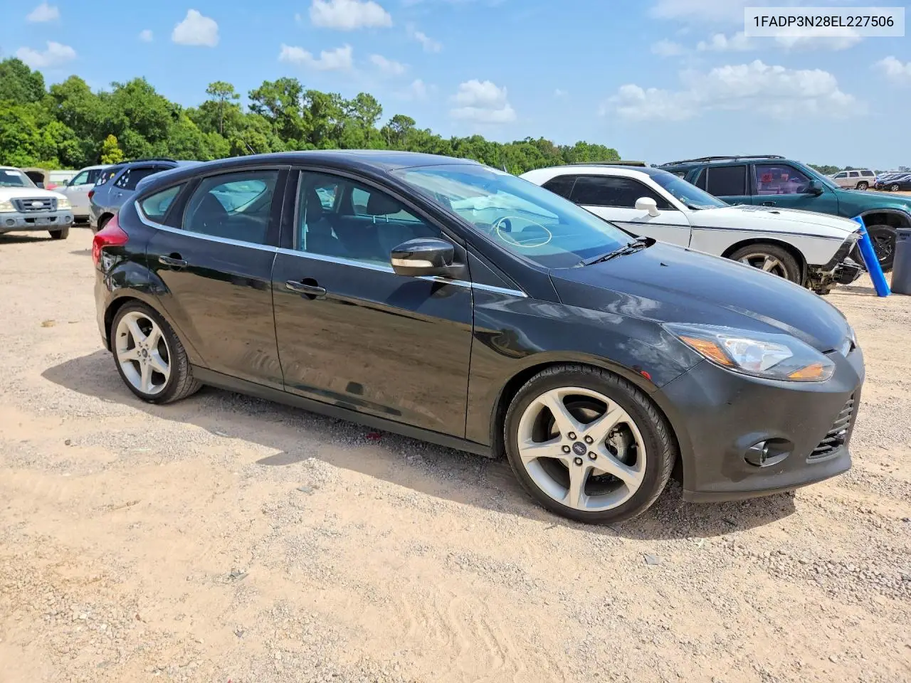 2014 Ford Focus Titanium VIN: 1FADP3N28EL227506 Lot: 61309916