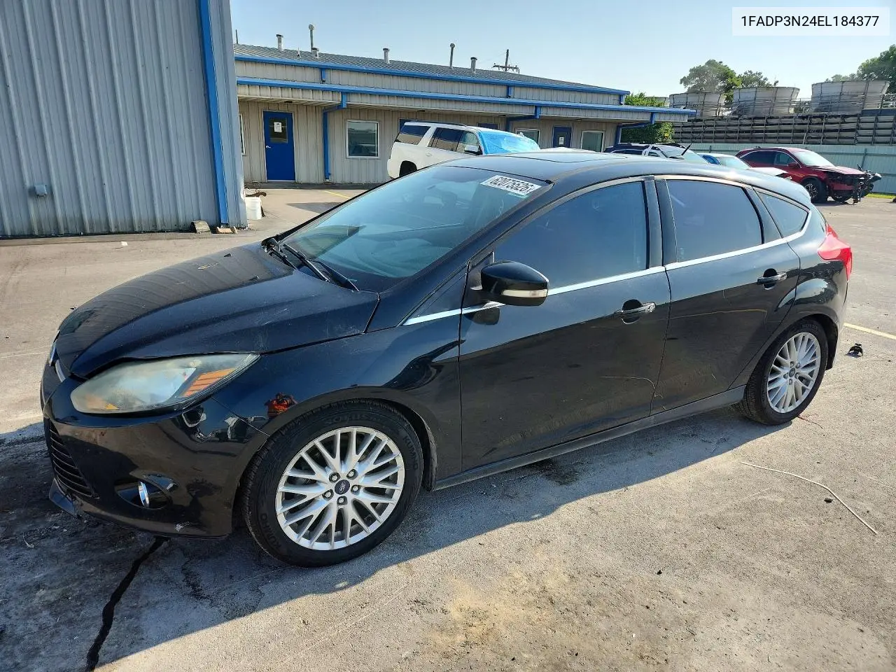 2014 Ford Focus Titanium VIN: 1FADP3N24EL184377 Lot: 62075526