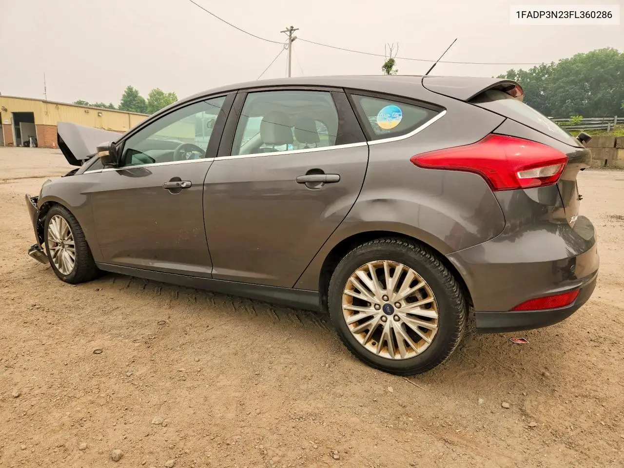 2015 Ford Focus Titanium VIN: 1FADP3N23FL360286 Lot: 61133676