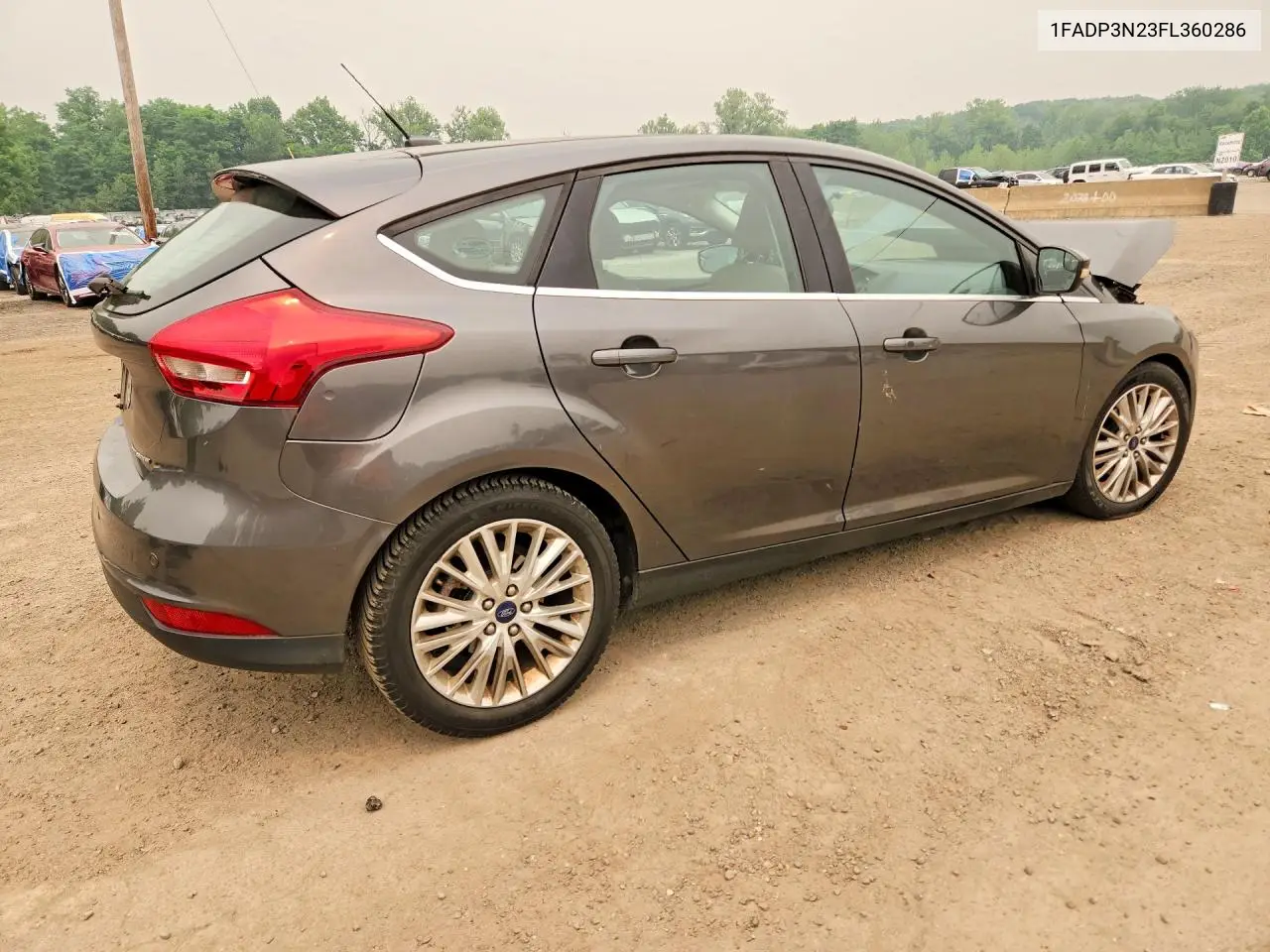 2015 Ford Focus Titanium VIN: 1FADP3N23FL360286 Lot: 61133676