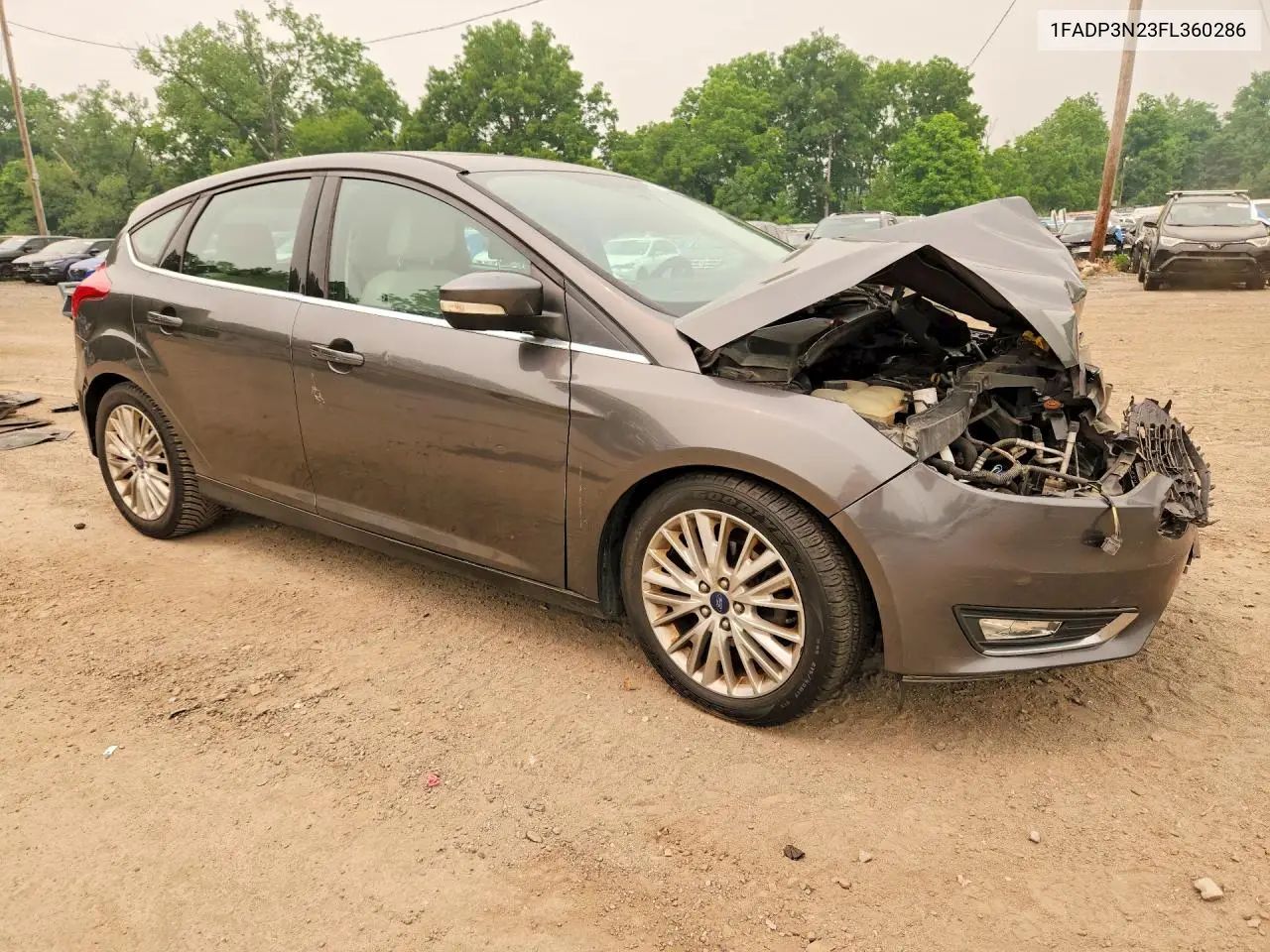 2015 Ford Focus Titanium VIN: 1FADP3N23FL360286 Lot: 61133676