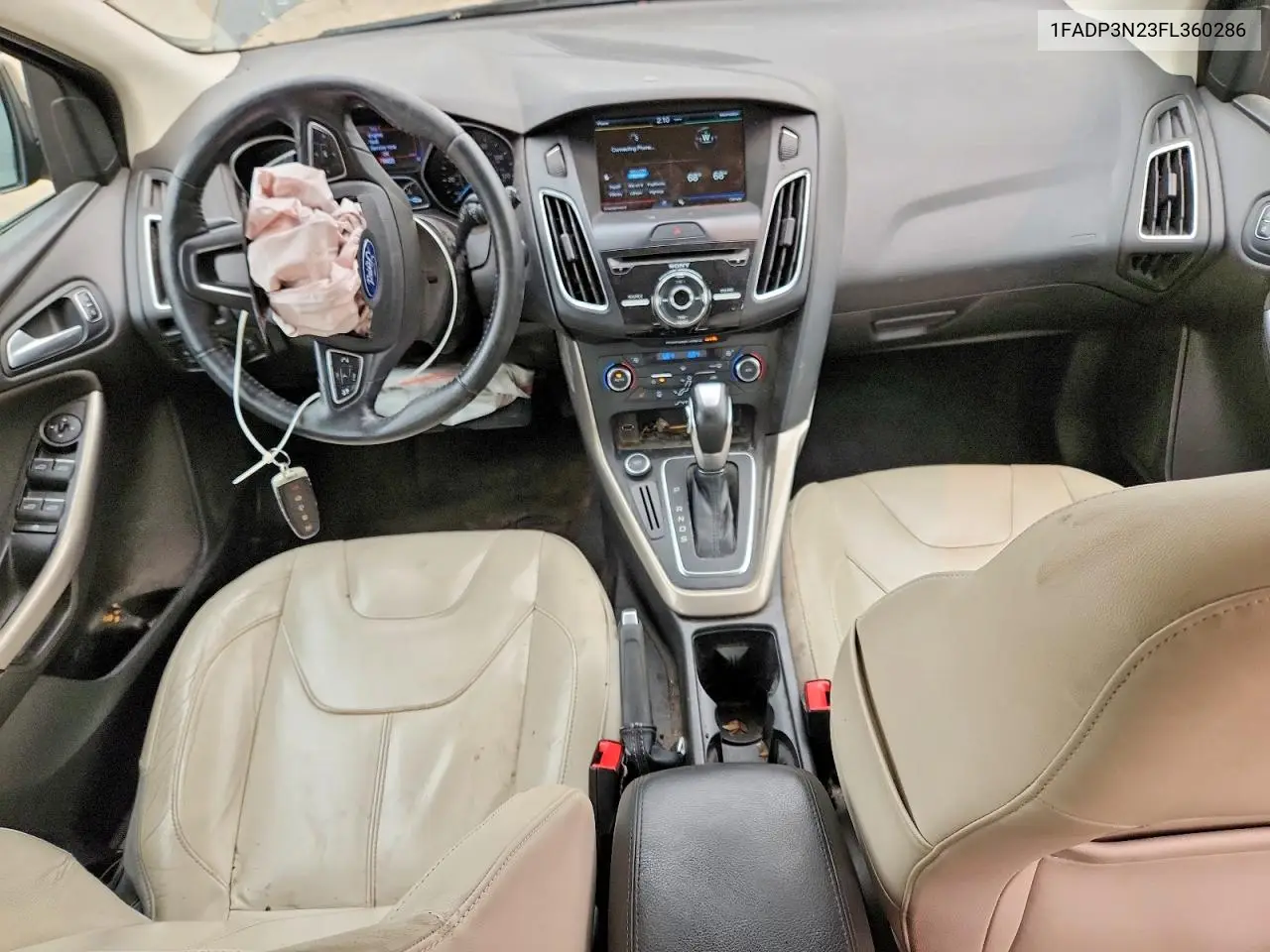 2015 Ford Focus Titanium VIN: 1FADP3N23FL360286 Lot: 61133676