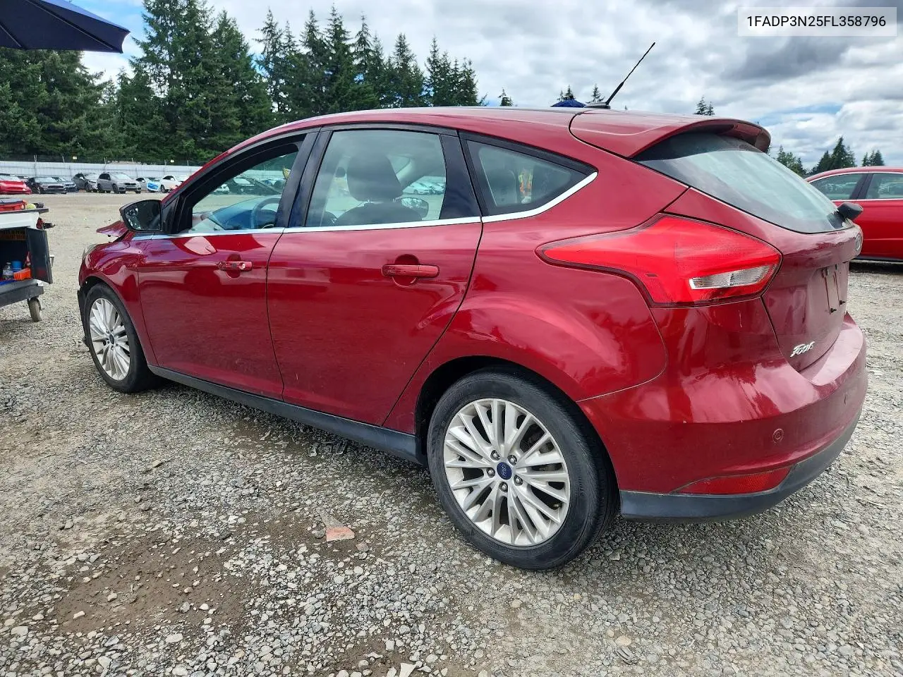2015 Ford Focus Titanium VIN: 1FADP3N25FL358796 Lot: 61342726