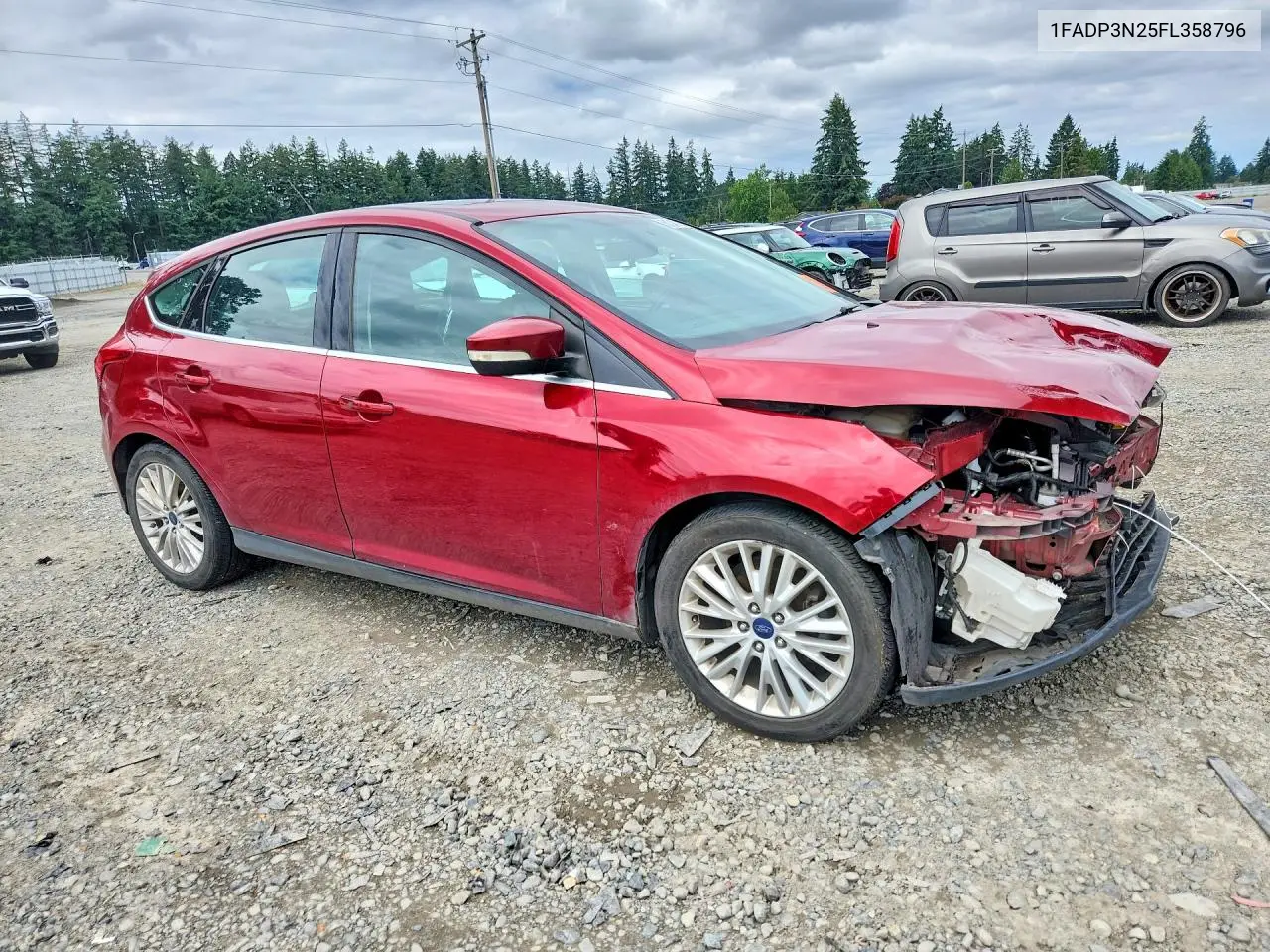 2015 Ford Focus Titanium VIN: 1FADP3N25FL358796 Lot: 61342726