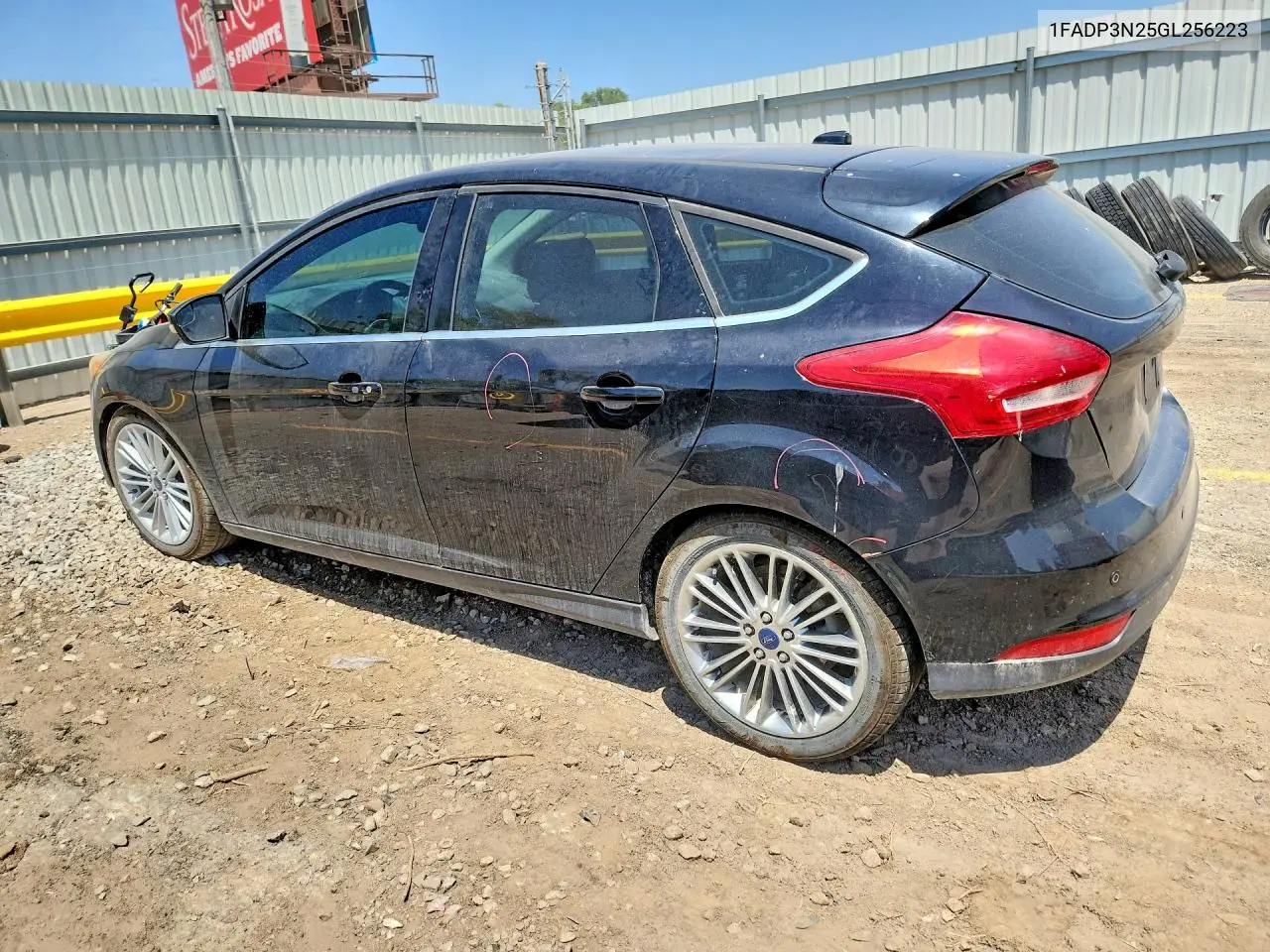 2016 Ford Focus Titanium VIN: 1FADP3N25GL256223 Lot: 61688476