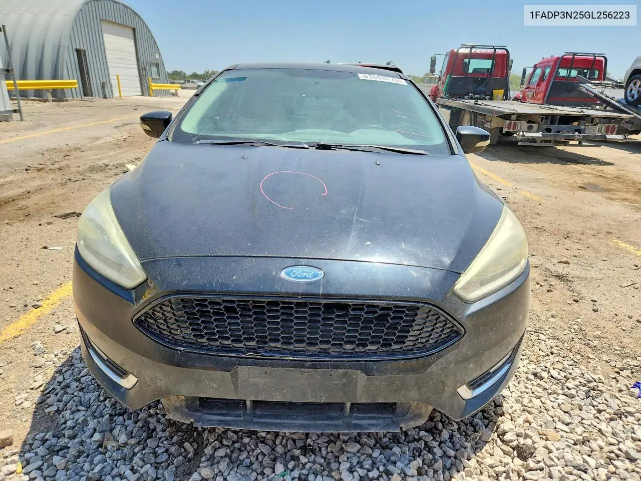 2016 Ford Focus Titanium VIN: 1FADP3N25GL256223 Lot: 61688476