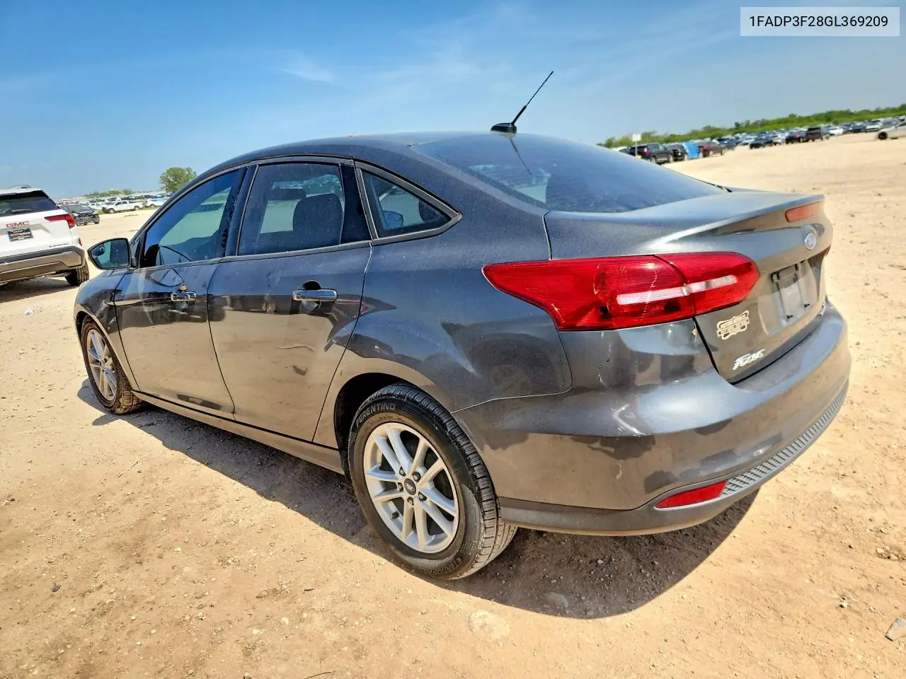 2016 Ford Focus VIN: 1FADP3F28GL369209 Lot: 62216136