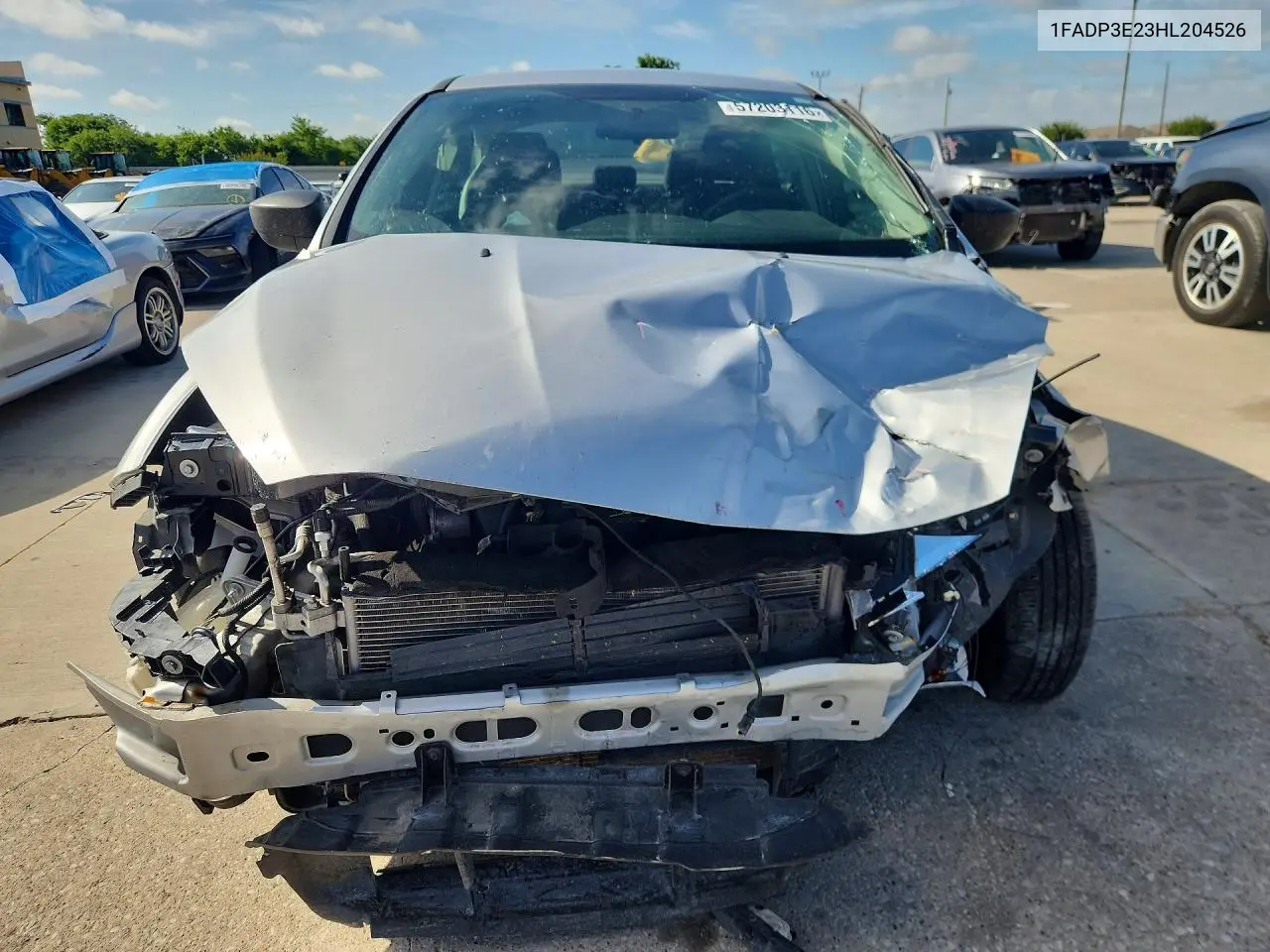 2017 Ford Focus S VIN: 1FADP3E23HL204526 Lot: 57203116