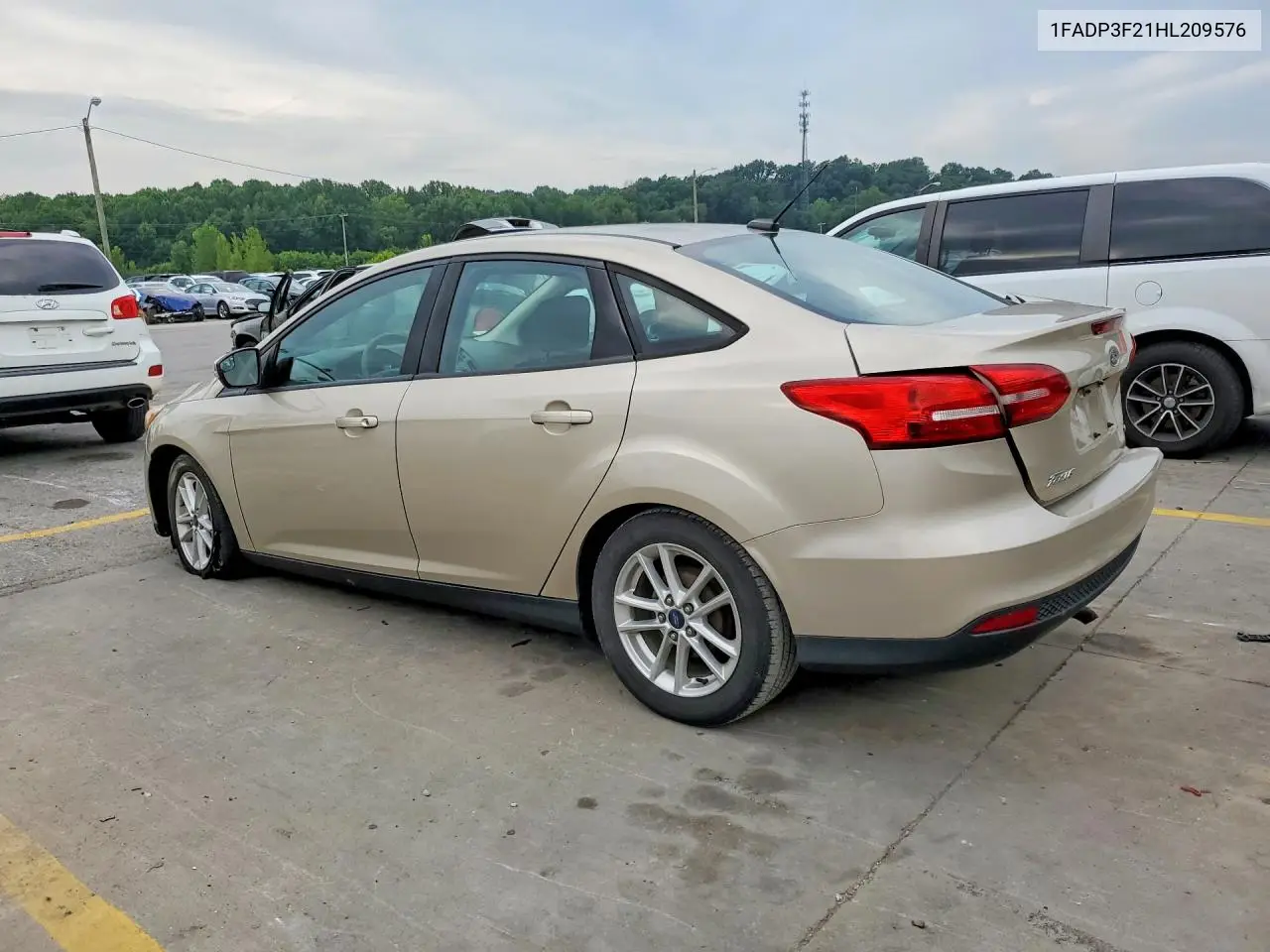 2017 Ford Focus Se VIN: 1FADP3F21HL209576 Lot: 61937176