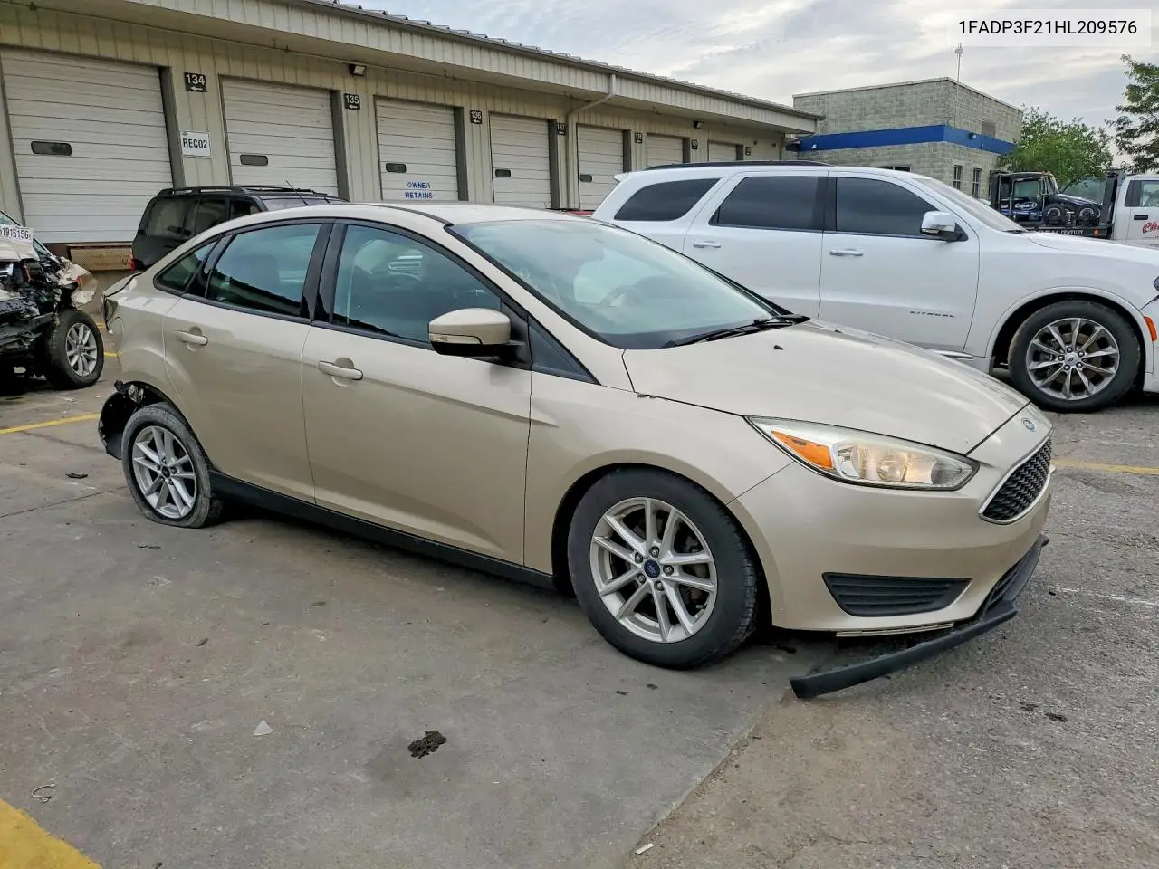2017 Ford Focus Se VIN: 1FADP3F21HL209576 Lot: 61937176