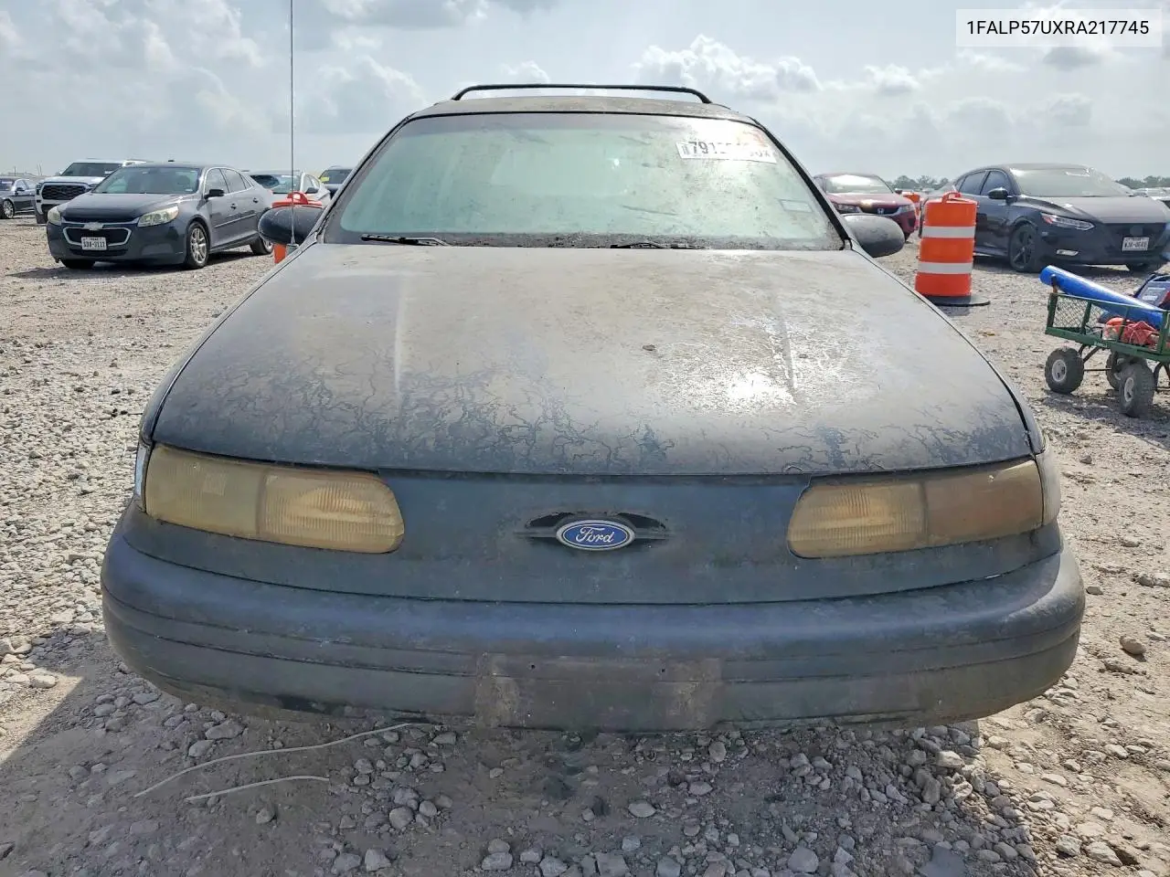 1994 Ford Taurus Gl VIN: 1FALP57UXRA217745 Lot: 79135705