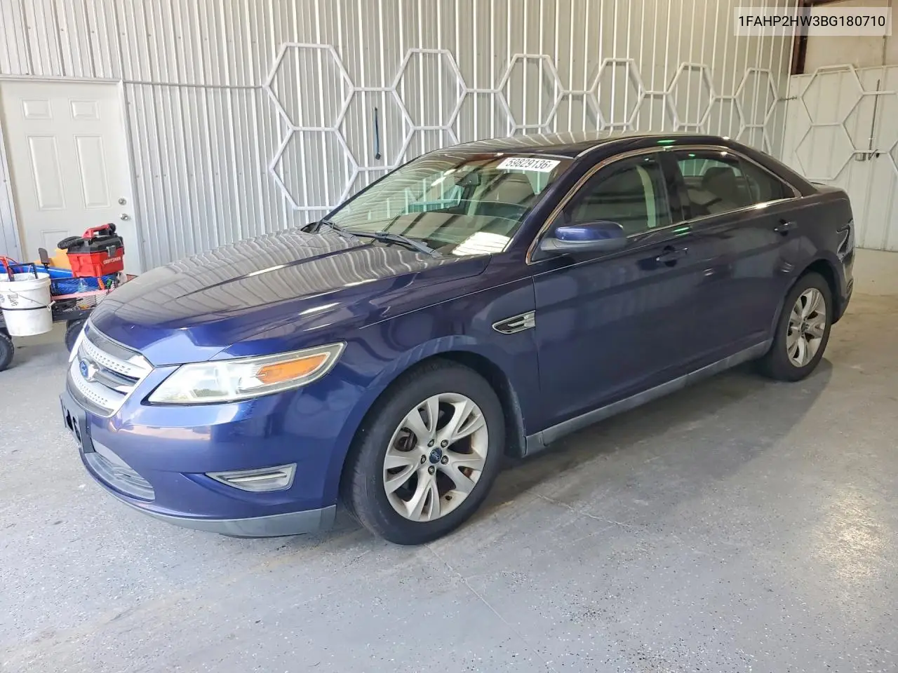 2011 Ford Taurus Sel VIN: 1FAHP2HW3BG180710 Lot: 59829136