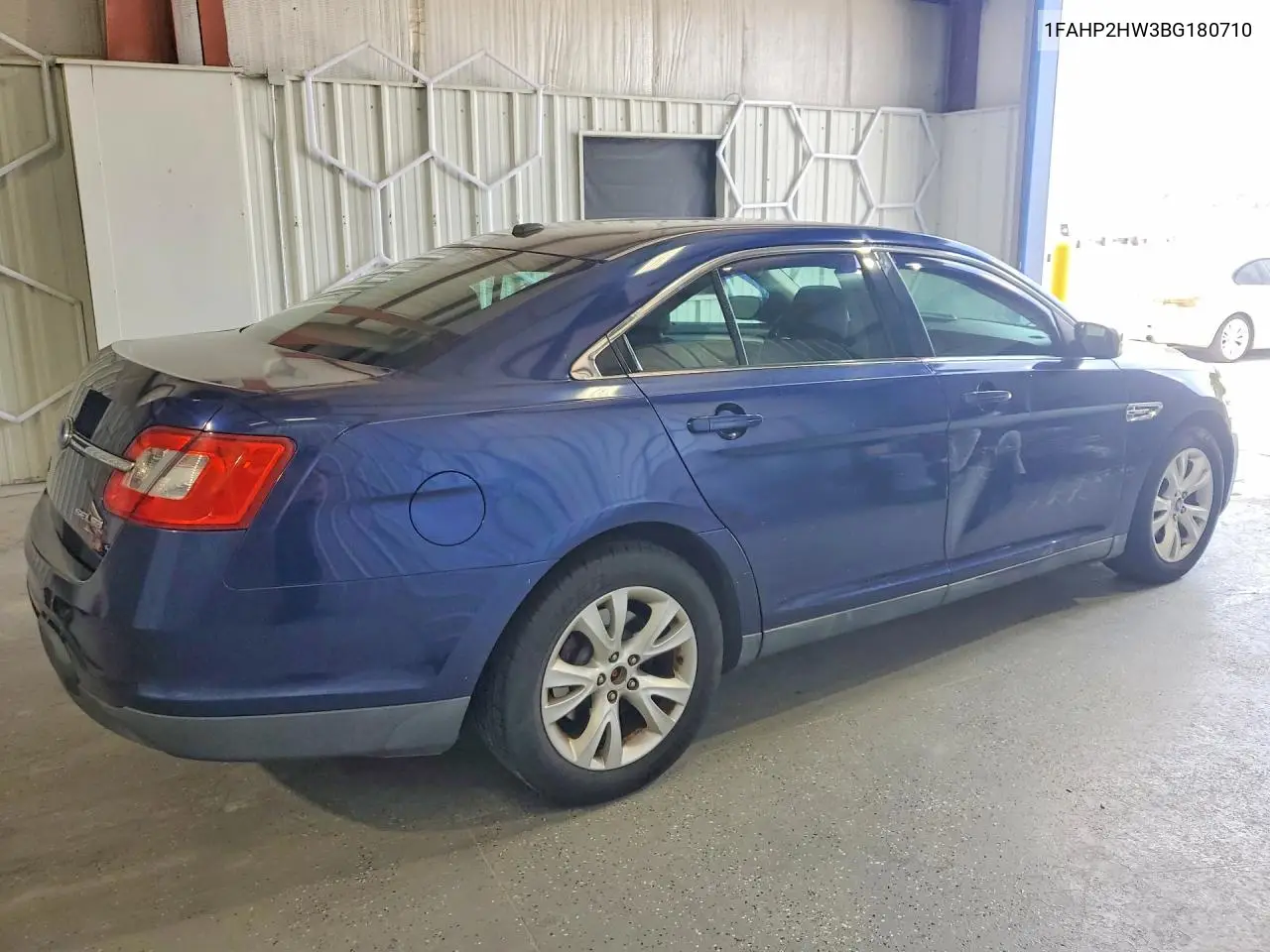 2011 Ford Taurus Sel VIN: 1FAHP2HW3BG180710 Lot: 59829136