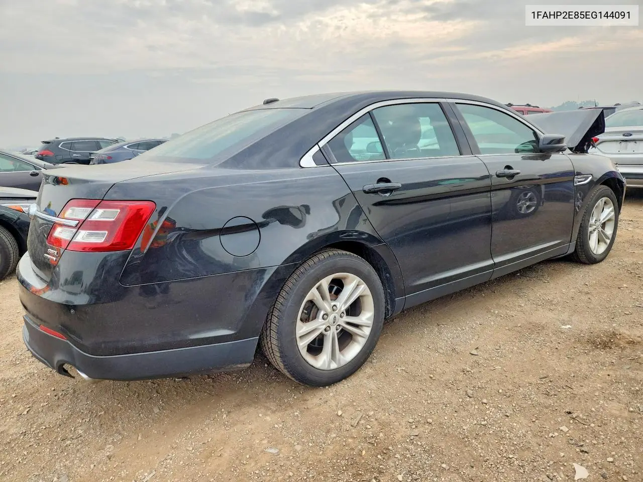 2014 Ford Taurus Sel VIN: 1FAHP2E85EG144091 Lot: 61517816