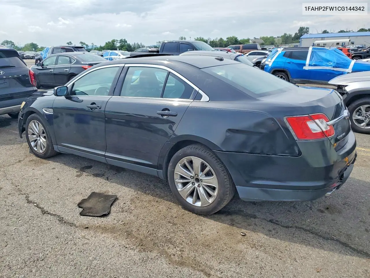 2016 Ford Taurus Limited VIN: 1FAHP2FW1CG144342 Lot: 60642366