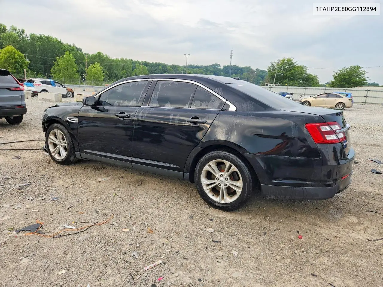 2016 Ford Taurus Sel VIN: 1FAHP2E80GG112894 Lot: 61890146