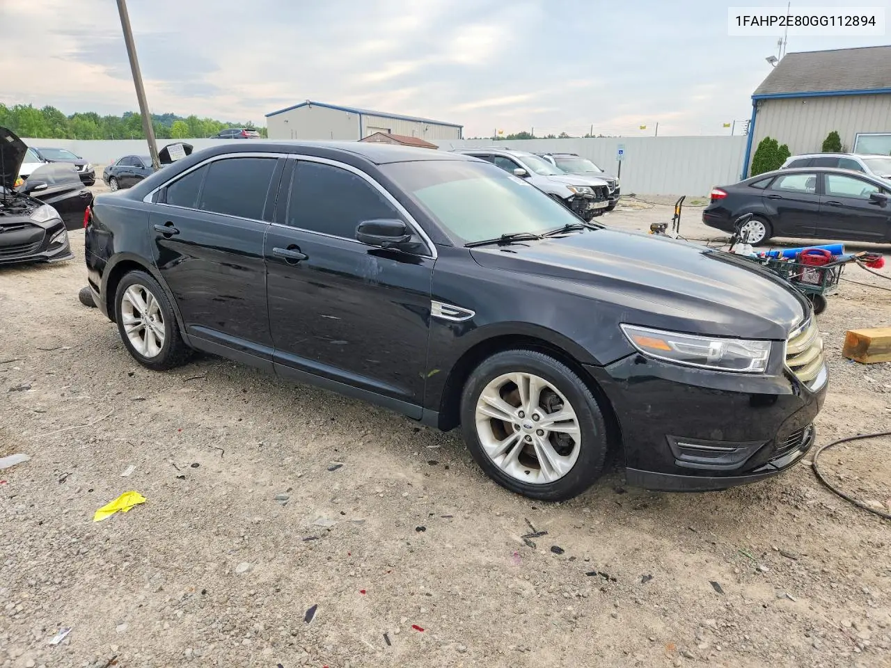 2016 Ford Taurus Sel VIN: 1FAHP2E80GG112894 Lot: 61890146