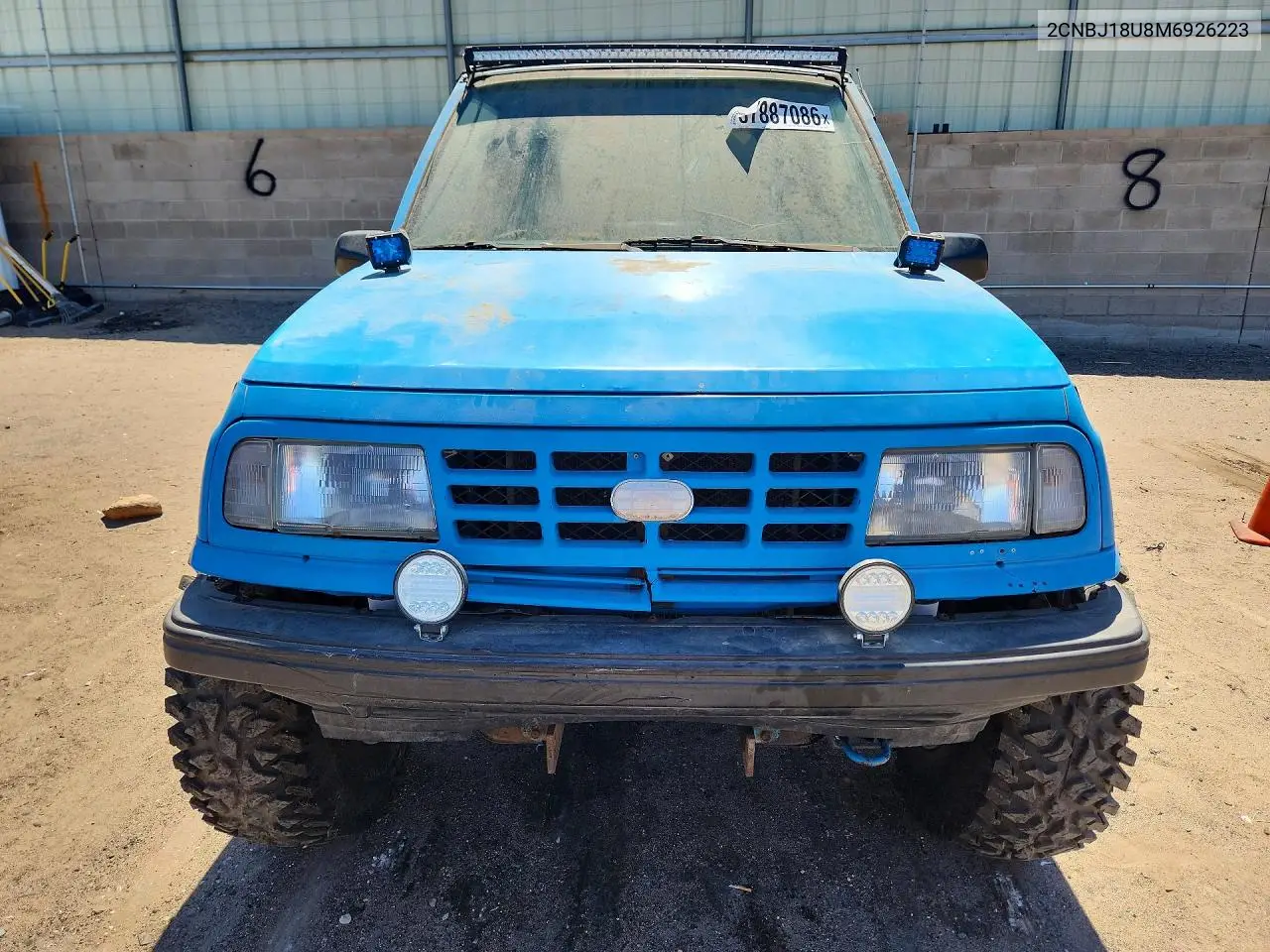 1991 Geo Tracker VIN: 2CNBJ18U8M6926223 Lot: 57887086