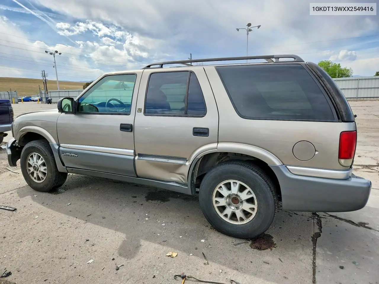 1999 GMC Jimmy VIN: 1GKDT13WXX2549416 Lot: 49110676