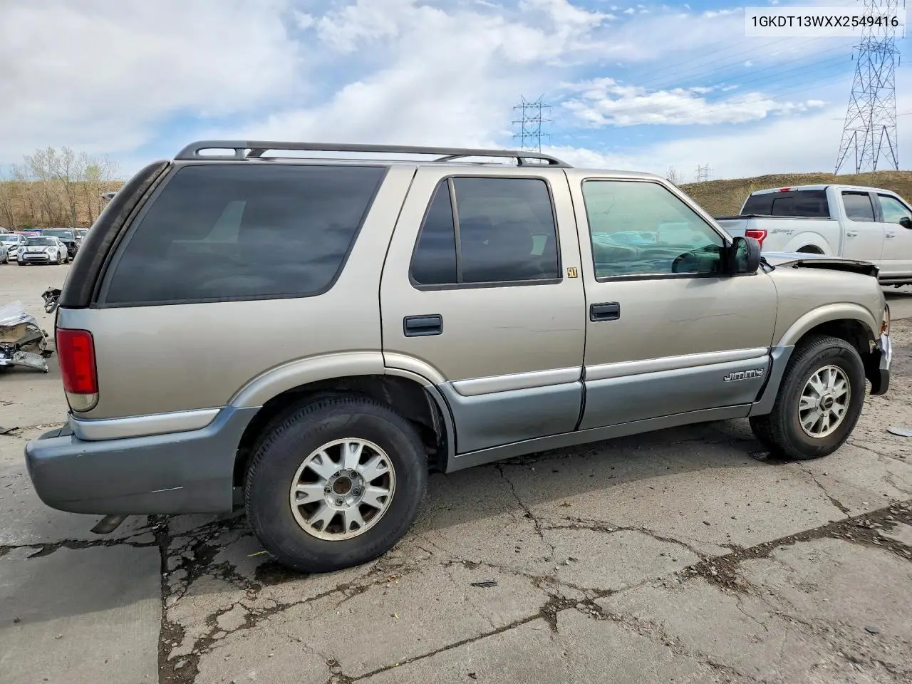 1999 GMC Jimmy VIN: 1GKDT13WXX2549416 Lot: 49110676