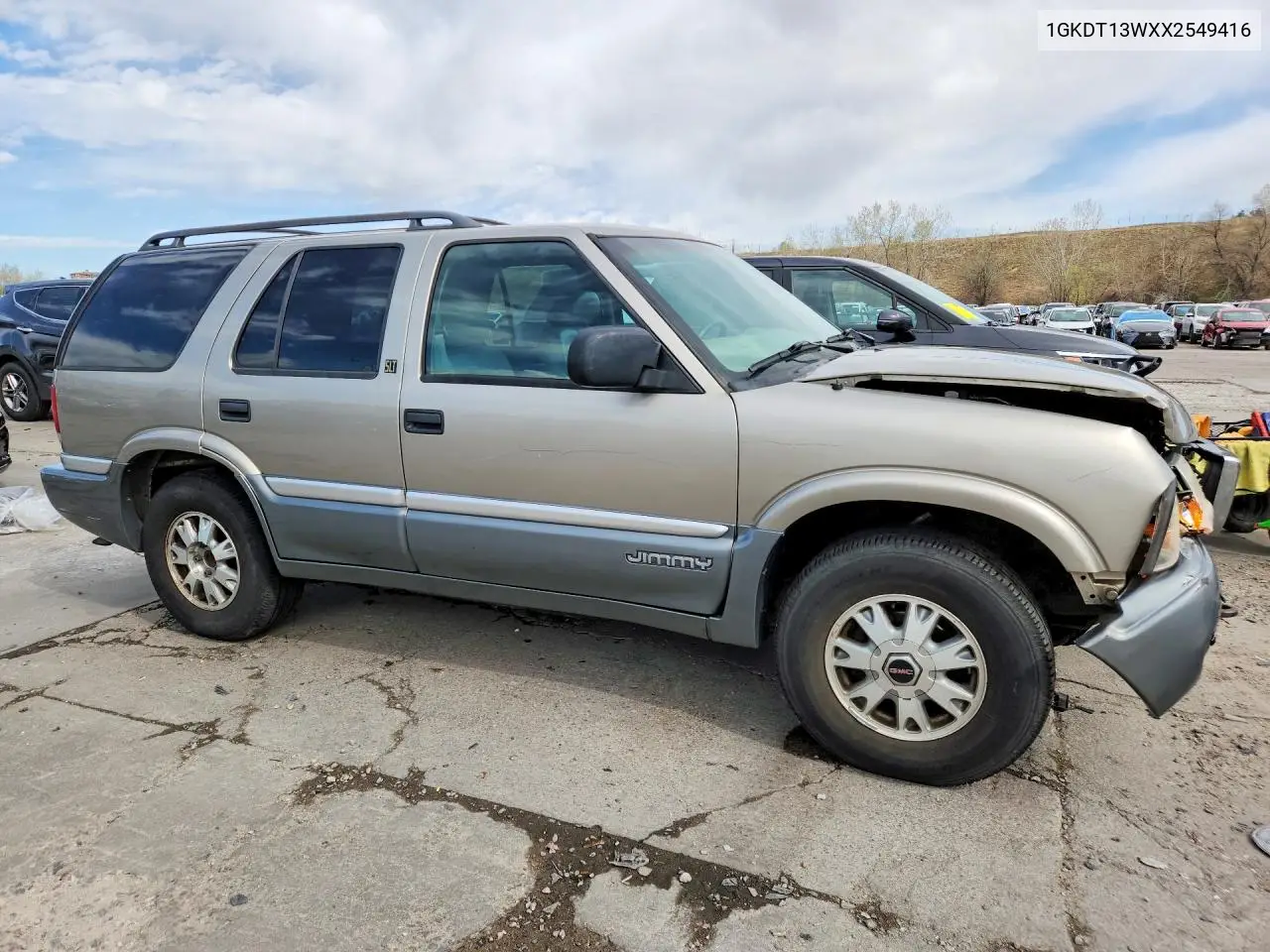 1999 GMC Jimmy VIN: 1GKDT13WXX2549416 Lot: 49110676