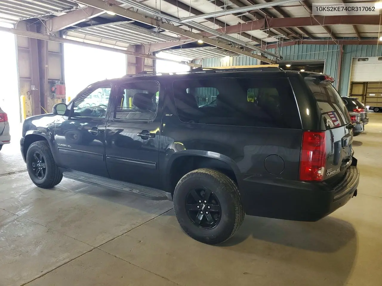 2012 GMC Yukon Xl K1500 Slt VIN: 1GKS2KE74CR317062 Lot: 61736406