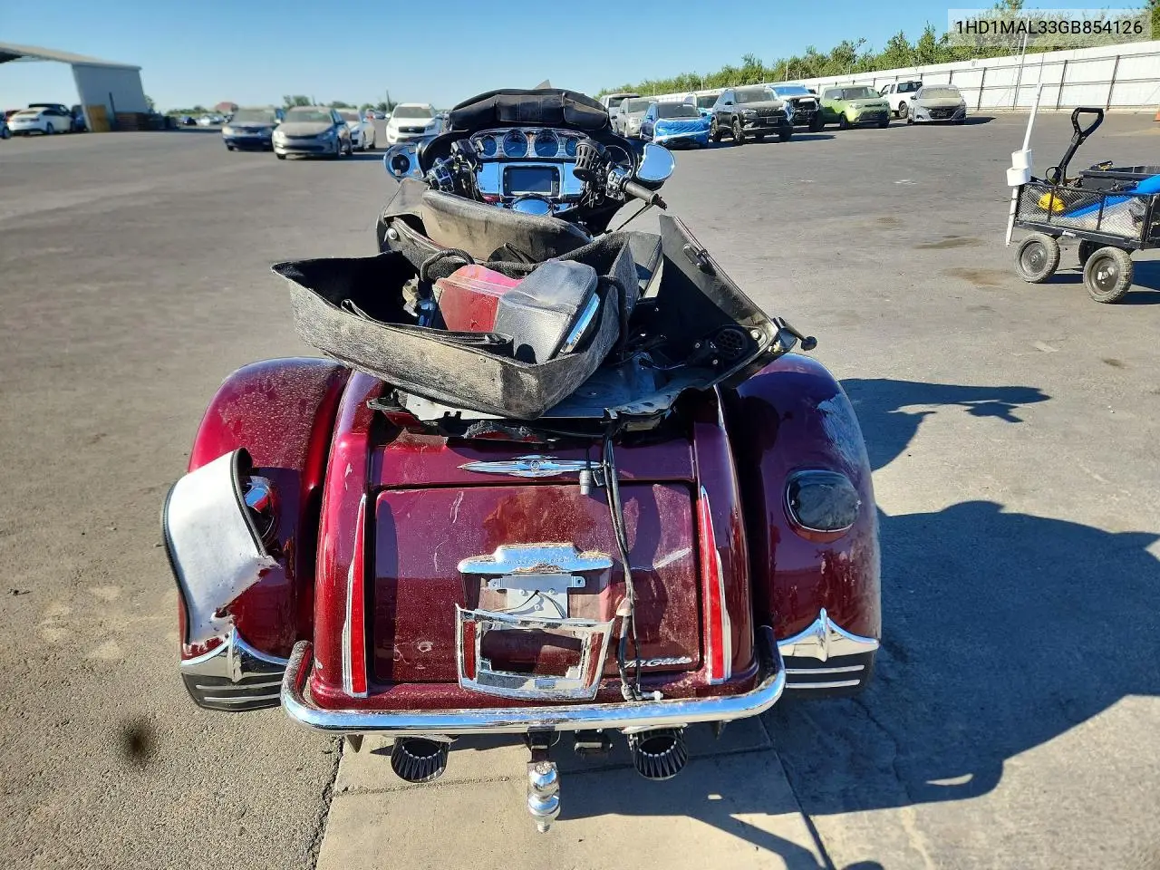 2016 Harley-Davidson Flhtcutg Tri Glide Ultra VIN: 1HD1MAL33GB854126 Lot: 60004826