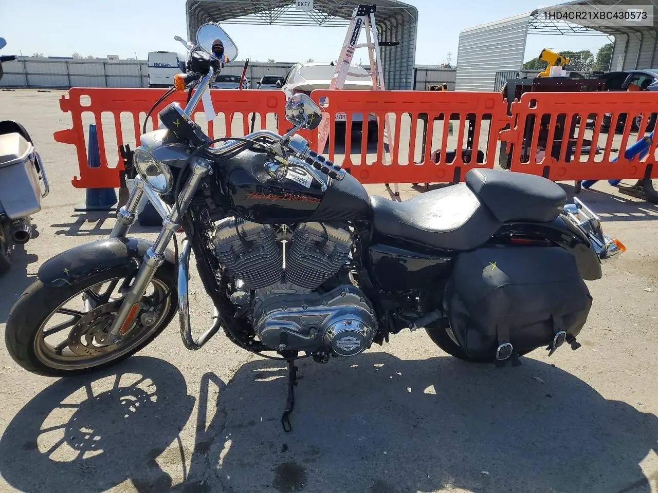 2011 Harley-Davidson Xl883 L VIN: 1HD4CR21XBC430573 Lot: 60818306