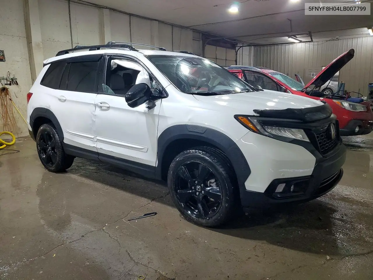 2020 Honda Passport Elite VIN: 5FNYF8H04LB007799 Lot: 56076756