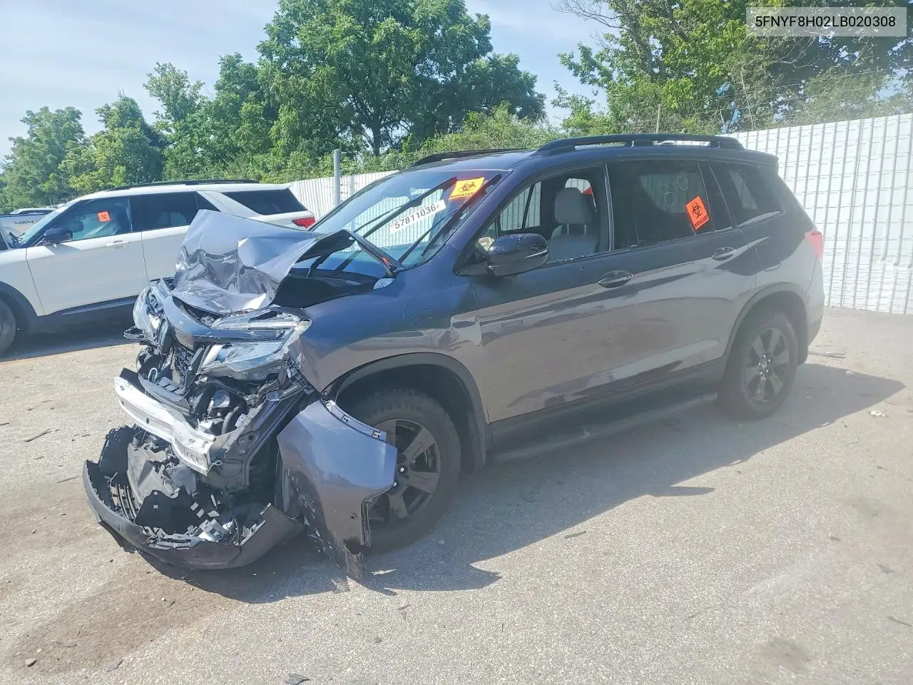 2020 Honda Passport Elite VIN: 5FNYF8H02LB020308 Lot: 57811036