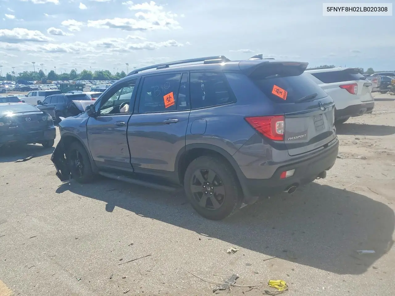 2020 Honda Passport Elite VIN: 5FNYF8H02LB020308 Lot: 57811036