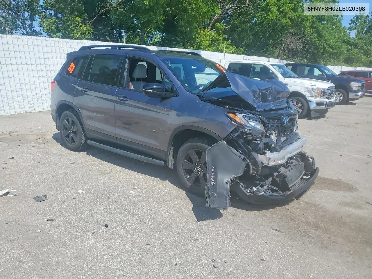 2020 Honda Passport Elite VIN: 5FNYF8H02LB020308 Lot: 57811036
