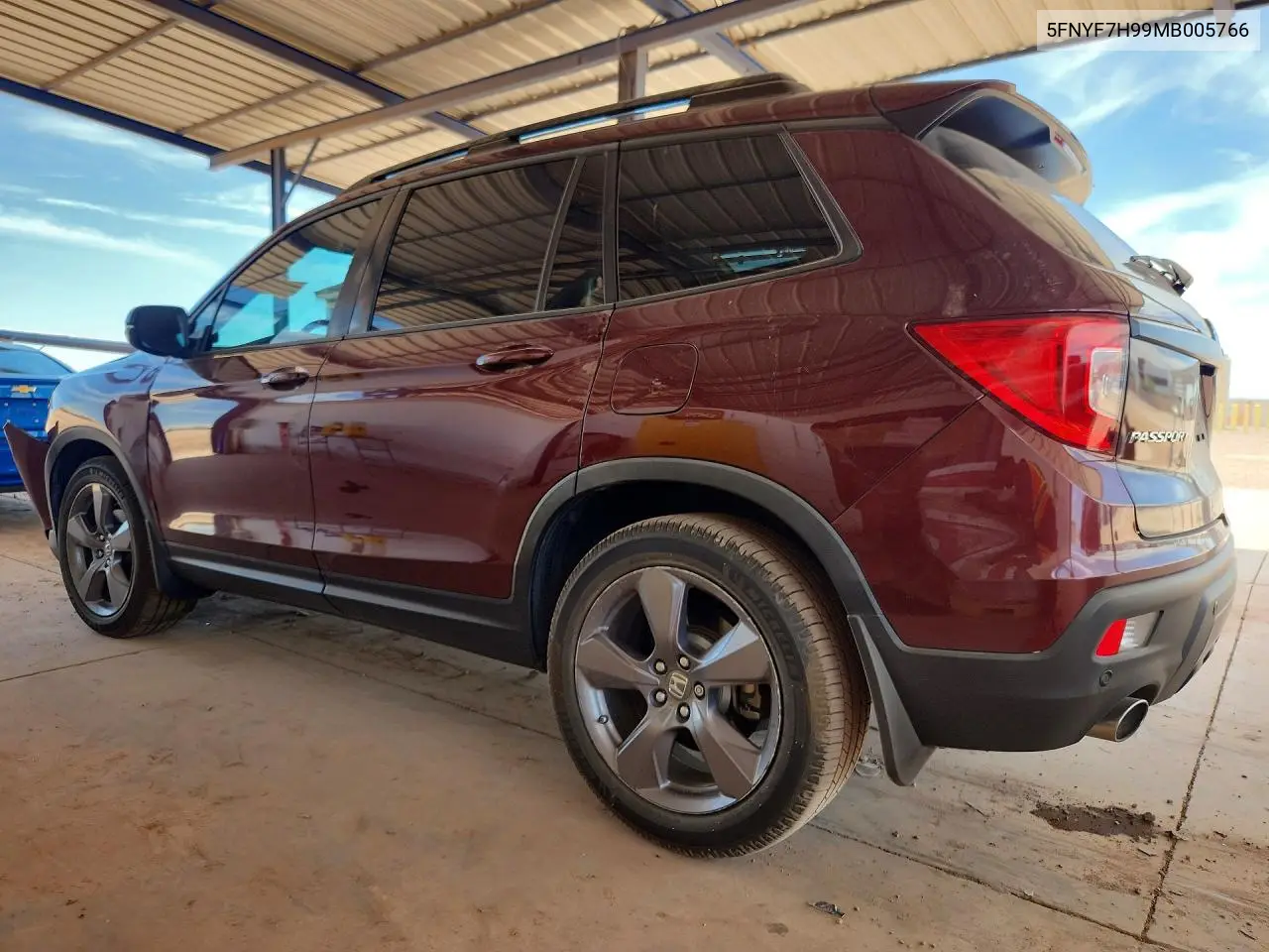 2021 Honda Passport Touring VIN: 5FNYF7H99MB005766 Lot: 57150386