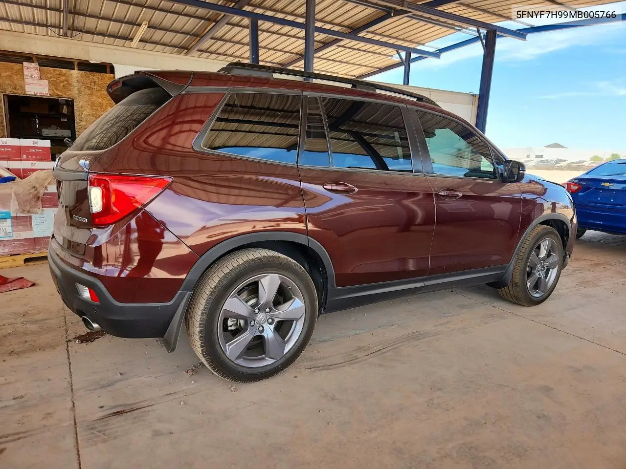 2021 Honda Passport Touring VIN: 5FNYF7H99MB005766 Lot: 57150386