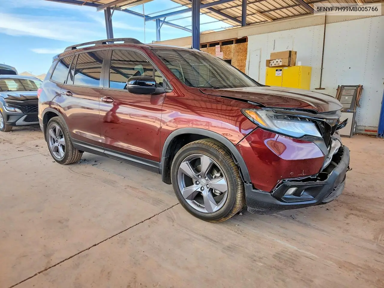 2021 Honda Passport Touring VIN: 5FNYF7H99MB005766 Lot: 57150386