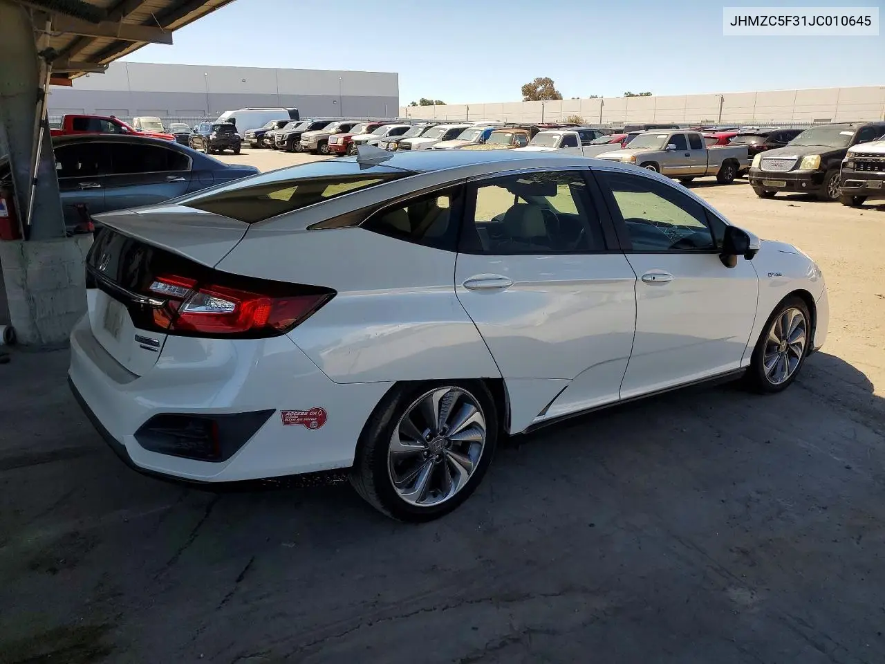 2018 Honda Clarity Touring VIN: JHMZC5F31JC010645 Lot: 61190086