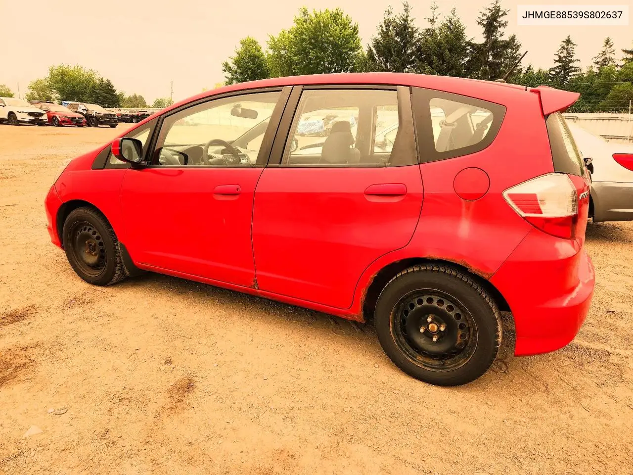 2009 Honda Fit Lx VIN: JHMGE88539S802637 Lot: 61036306