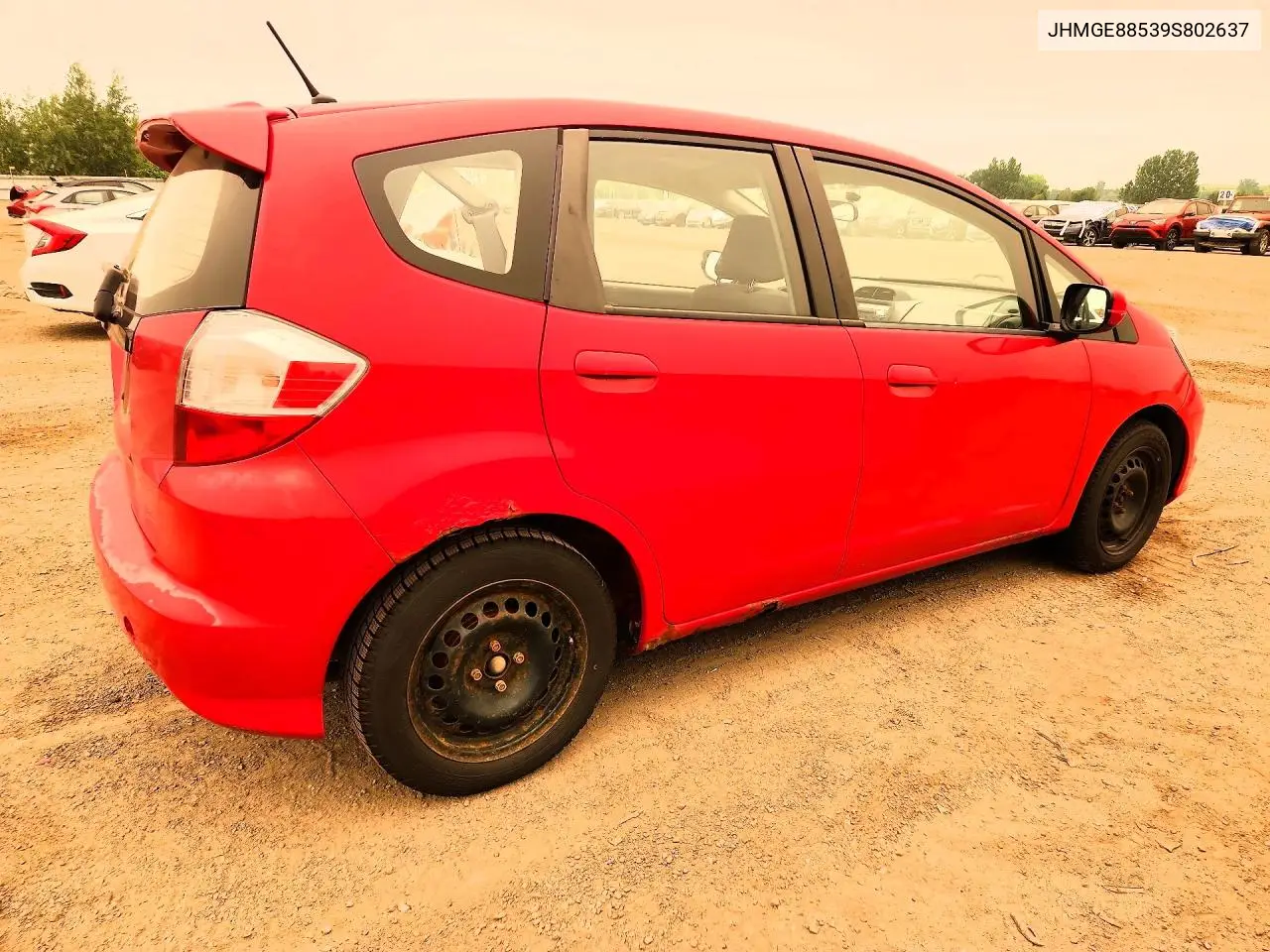 2009 Honda Fit Lx VIN: JHMGE88539S802637 Lot: 61036306